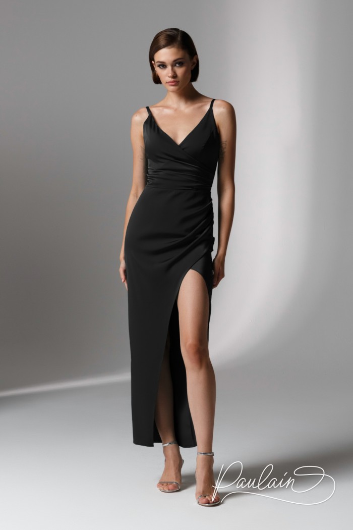 A satin black evening dress with a deep neckline and a high slit- PRIMROSE | Paulain