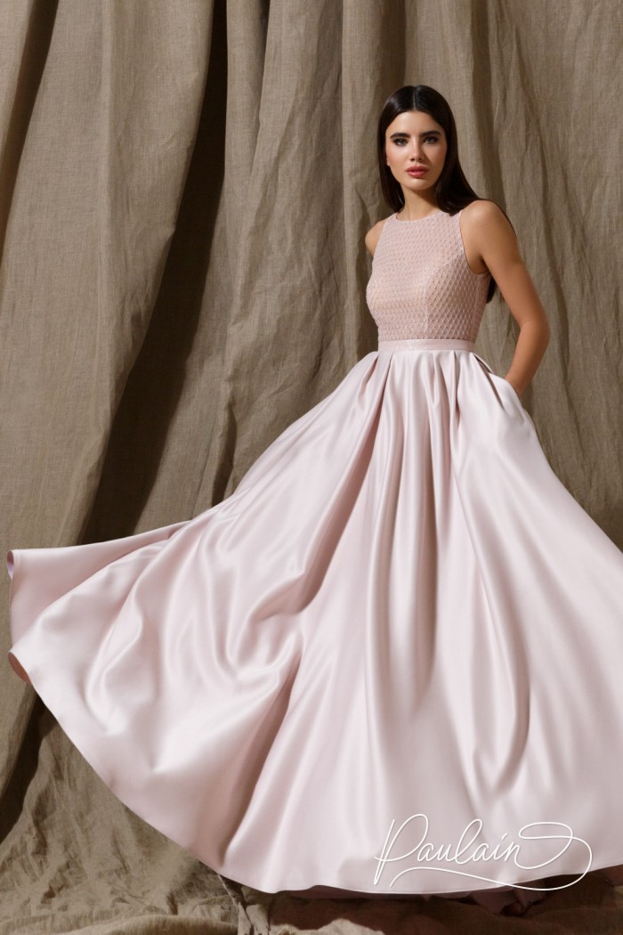 Elegant dress with a shiny bodice and skirt with pockets- INGE | Paulain